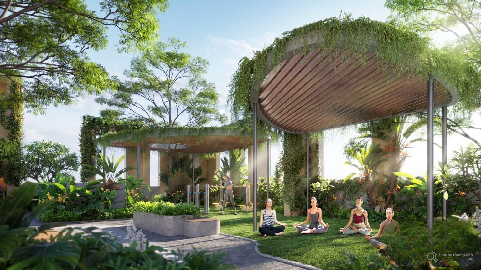 A group of people sitting in the grass Description automatically generated